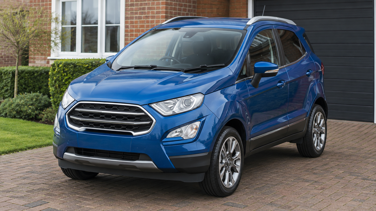 Illustrative Ford EcoSport parked on a UK driveway in natural daylight, not a customer vehicle.